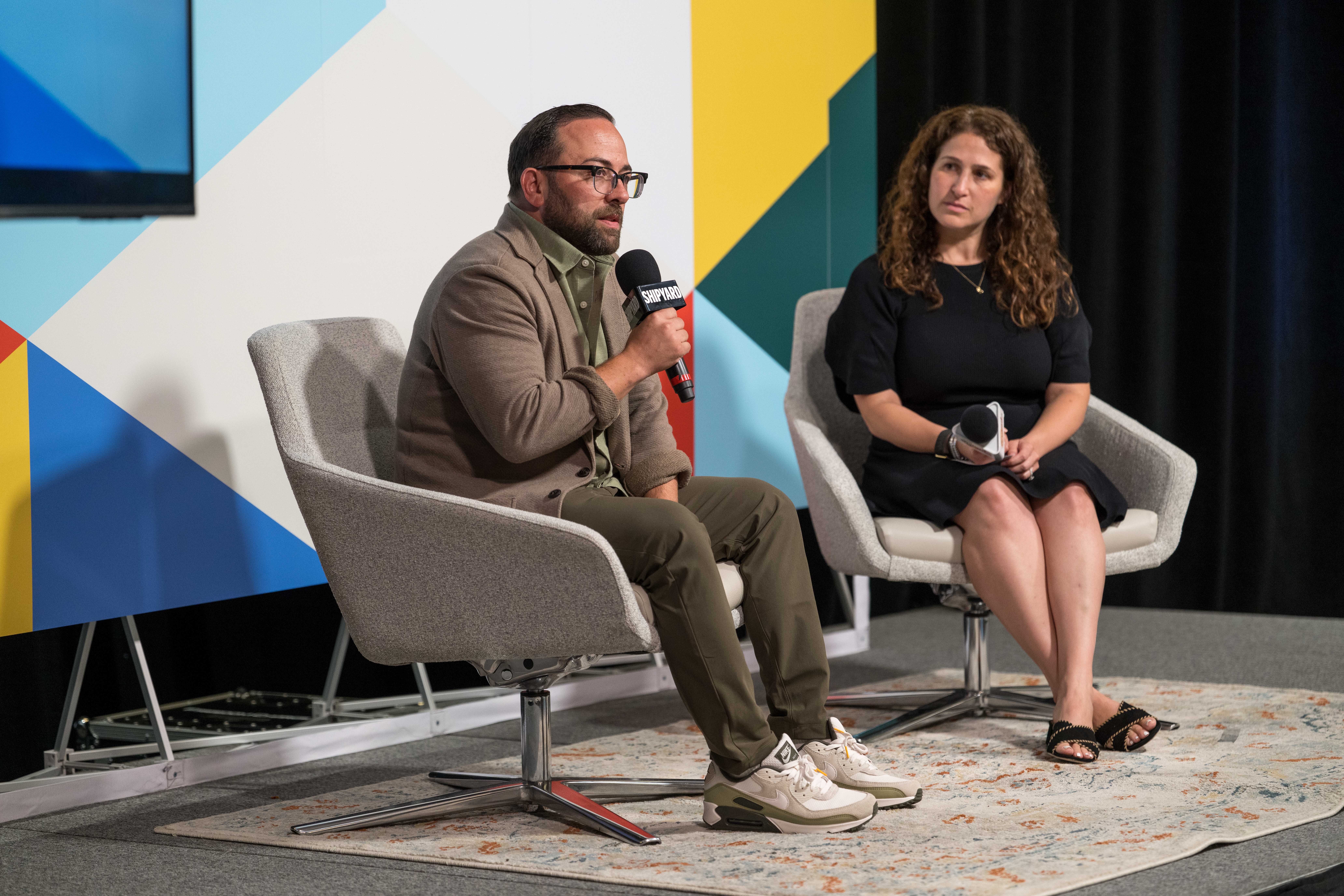 Aaron Sobol sitting and speaking on stage at The Shipyard's 2026 Engineering Brand Love Summit